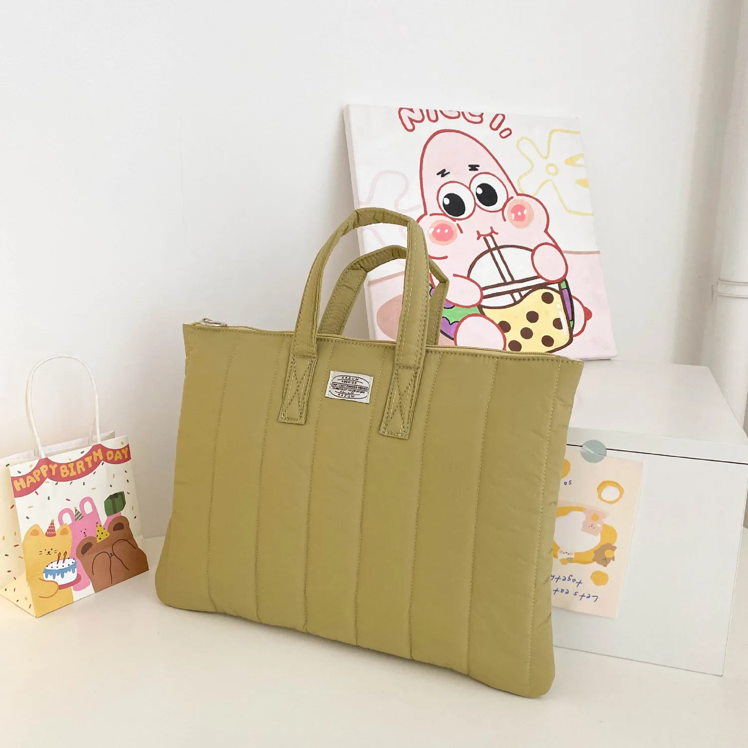 Lecoinpochette Olivier sac ordinateur kaki matelassé