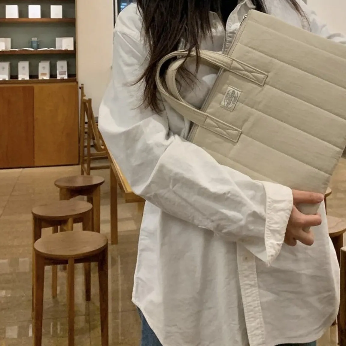Lecoinpochette Rice sac ordinateur blanc cassé matelassé